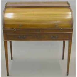 A George III mahogany cylinder bureau, with three quarter pierced satinwood and mahogany tambour,...