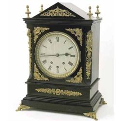 A late 19th century musical bracket clock, with 7.25ins silvered dial, striking hours and quarter...