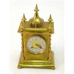 A 19th century French gilt brass mantel clock, with silvered Arabic dial, 10.5ins...