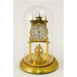 A lacquered brass 400 day timepiece...