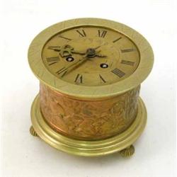 A French 17th style brass table clock, with circular case and classical battle scene frieze, 5.25...