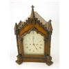 Image 1 : A Victorian oak Gothic mantel clock, with painted arched Roman dial with strike / silent and twin...