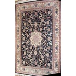 A large Chinese carpet, the black ground with central cream floral medallion and all over design...