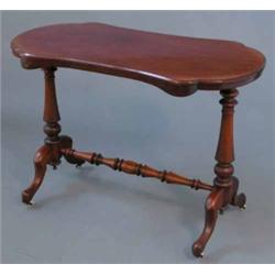 A Victorian mahogany occasional table, with waisted oval top on standard end supports, 3ft 4ins...