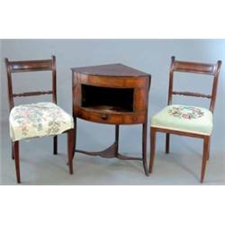 A pair of Regency mahogany single dining chairs, with rope twist backs on sabre legs. A George II...