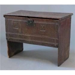 A late 17th century oak six plank coffer, initialled AM, 2ft 9ins...