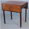 Image 1 : A George III mahogany and crossbanded Pembroke table, with single drawer on fluted chamfered legs...