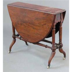 A Victorian figured walnut oval top Sutherland table, on turned legs, 2ft 9ins...