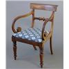 Image 1 : A late Regency mahogany elbow chair, with scroll arms, on turned baluster legs...