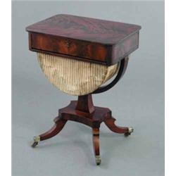 A William IV mahogany work table, with drawer and 'U' shaped pleated basket on four outswept legs...