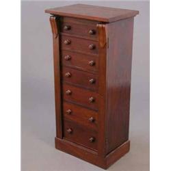 A Victorian mahogany Wellington chest, with seven drawers and locking bar on plinth base, 1ft 8in...