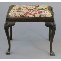 A mahogany stool, with tapestry seat on cabriole legs, 1ft 9ins...