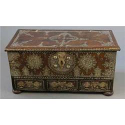 A 19th century Zanzibar brass mounted teak mule chest, with rising top over three drawers on bun...
