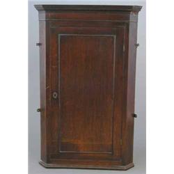 A George III oak hanging corner cabinet, with mahogany crossbanded decoration, 2ft 7ins...