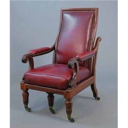 A William IV mahogany reclining library chair, upholstered red leather with slide out action on t...