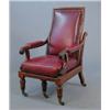 Image 1 : A William IV mahogany reclining library chair, upholstered red leather with slide out action on t...