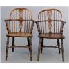 Image 1 : A near pair of early 19th century yew Windsor elbow chairs, with hoop backs and elm seats on turn...