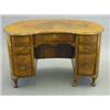 Image 1 : A 1920's walnut and crossbanded kidney shape desk, with nine drawers on short cabriole legs, 4ft...