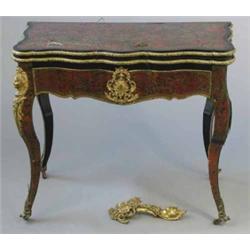 A 19th century boulle serpentine card table, with gilt brass mounts on cabriole legs, 2ft 10ins...