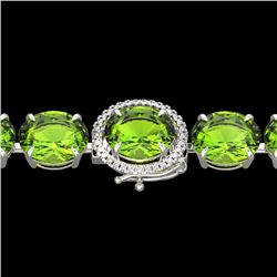 67 CTW Peridot & Micro VS/SI Diamond Halo Designer Bracelet 14K White Gold - REF-428Y8K - 22270