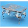 Image 1 : An Edwardian silver jewellery box modelled as an 18th century serpentine table, the hinged lid de...