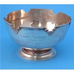 A George VI silver rose bowl, with shaped Art Deco style rim, supported upon a stepped circular b...