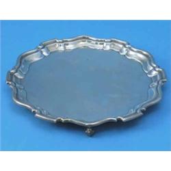 A George V silver salver, with pie crust border, Birmingham 1936, 14.5oz, 9.5ins diam...