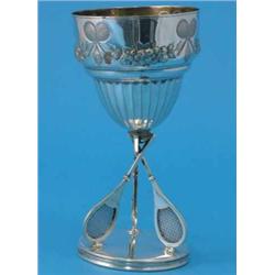 A plated tennis trophy cup, 8.75ins...