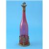Image 1 : A Victorian cranberry glass decanter, with silver collar and plated stopper and stand, decorated...