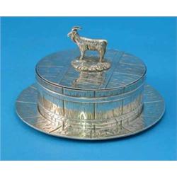 A Victorian silver butter dish and cover, modelled as a staved churn with goat finial, London 184...