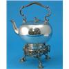 Image 1 : A plated kettle on stand, with caned scroll handle and foliate cast tripod base, 12ins...