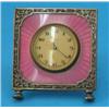 Image 1 : A George V silver and pink enamel timepiece, decorated with a pierced and engraved foliate bands...