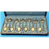 Image 1 : A cased set of 12 19th century French silver gilt teaspoons, each handle moulded with foliate mot...