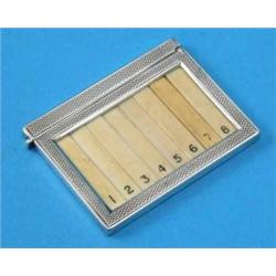 A George V silver cased set of 8 ivory shooting butt markers, with engine turned decoration, Lond...