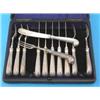Image 1 : An Edwardian cased set of 6 pairs of silver pistol grip dessert knives and forks, maker Francis H...