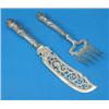 Image 1 : A pair of Victorian pierced silver fish servers, decorated throughout with foliate motifs and scr...