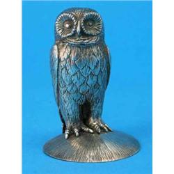 A silver model of an owl, perched on a textured dome base, London 1979, 3.75ins...