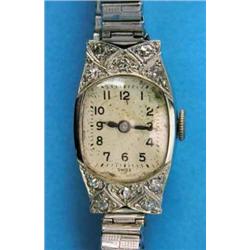 An lady's diamond set 18ct white gold cocktail watch, on later bracelet...