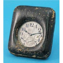 A Waltham leather cased 8-day travelling timepiece...