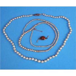 A single row cultured pearl necklace, and a seed pearl necklace...