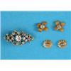 Image 1 : A small openwork lozenge shaped gold brooch, set clear pastes and a pair of ear studs...
