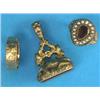 Image 1 : A Victorian gold ring, set with a pear shaped flat-cut garnet within a border of seed pearls, a l...