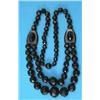 Image 1 : A Victorian jet necklace, the front with 2 rows of graduated faceted beads on a single back row o...