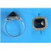 Image 1 : A platinum ring, set with a rectangular cabochon-cut sapphire within a border of rose-cut diamond...
