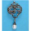 Image 1 : An 18ct white gold pendant/brooch of scroll design set diamonds with articulated cultured pearl d...
