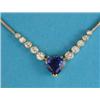 Image 1 : An 18k white gold snake link pendant necklace, claw-set with a heart shaped sapphire flanked by 1...