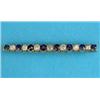 Image 1 : An Edwardian gold bar brooch, claw-set with alternating round cut sapphires and diamonds (cased)...