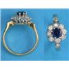 Image 1 : An 18ct gold, sapphire and diamond circular cluster ring, with diamond set shoulders...