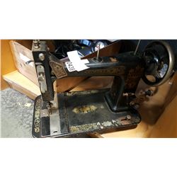 RAYMOND ANTIQUE SEWING MACHINE