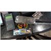 Image 3 : NEW HAND SAW SCIENTIFIC CALCULATOR AND SUNGLASSES